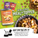 Advertisement for Frommbo Guman dog food cans with text about meal or topper.