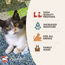 Cat lying on a patterned blanket next to a product label with features and brand name.