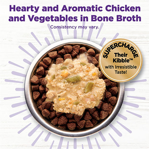 Pet food bowl with kibble and a scoop of wet food, labeled 'Hearty and Aromatic Chicken and Vegetables in Bone Broth'.
