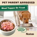 Dog eating from a bowl with pink protein and hydration booster, branded as Natoo.