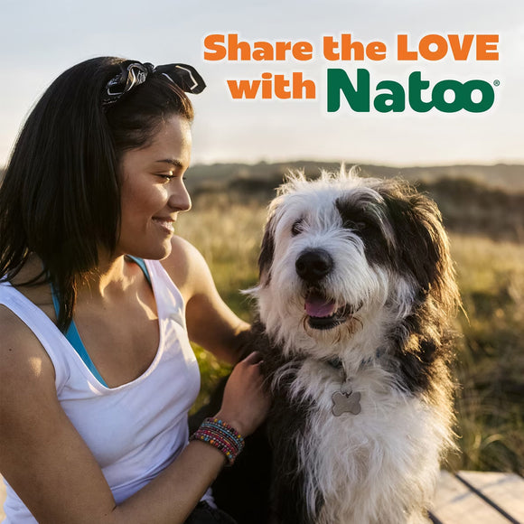 Woman with a dog in a field with 'Share the LOVE with Natoo' text overlay