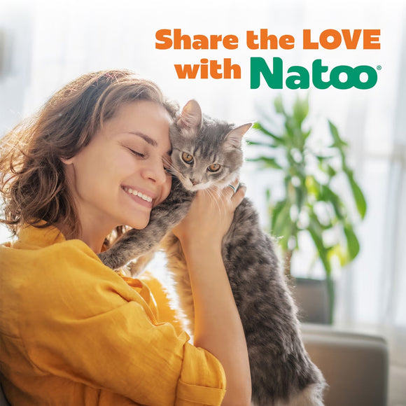 Woman in yellow shirt holding a cat with 'Share the LOVE with Natoo' text above.