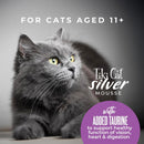 Gray cat with text about Tiki Cat Silver Mousse for senior cats on a gray background