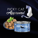 Purina Snickity can of duck stew with 'Picky Cat Approved' text and cat illustration on a dark background