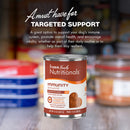 Can of 'from family Nutritionals' dog food on a blurred background with text about targeted support.