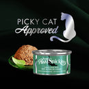 Can of PureSnickity cat food with a piece of duck liver on a dark background, featuring 'Picky Cat Approved' text and logo.