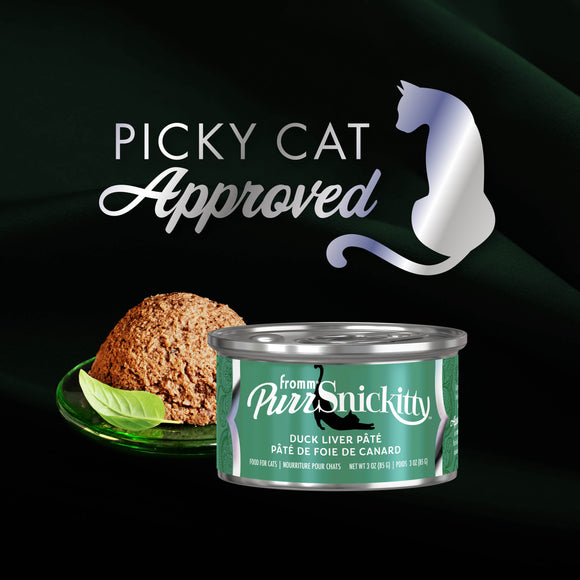 Can of PureSnickity cat food with a piece of duck liver on a dark background, featuring 'Picky Cat Approved' text and logo.