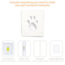 Pet pawprint keepsake kit with air-drying clay, plastic ruler, rolling pin, and double-sided tape on a white background.