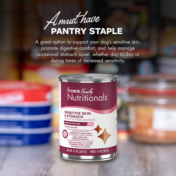 Can of Fromm Family Nutritionals dog food on a blurred pantry background