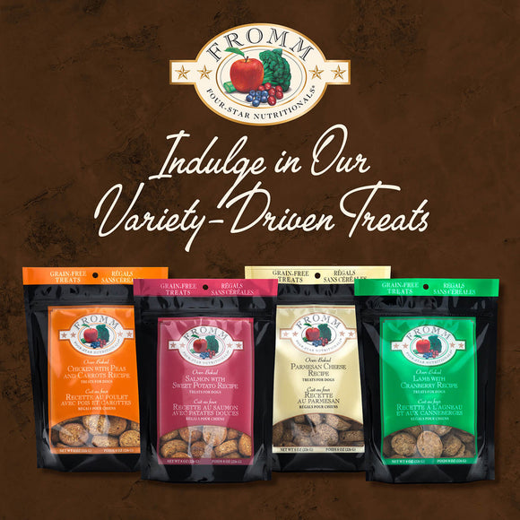 Assorted packages of Fromm pet treats on a brown background with the brand logo.