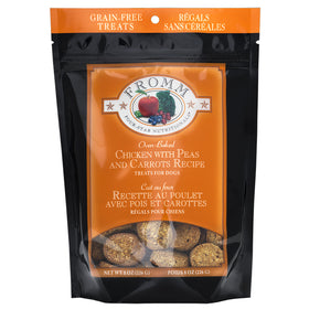 Package of Fromm dog treats with chicken, peas, and carrots on an orange background