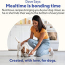 Woman in yellow shirt and blue jeans kneeling on the floor with a small dog, with text about bonding time and nutritious recipes.
