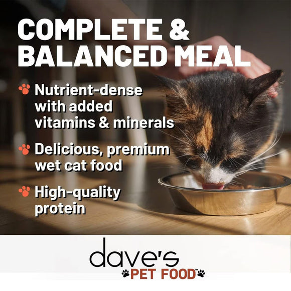 Cat drinking from a bowl with text about dave's pet food on a wooden surface.