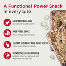 Dog treat packaging with text highlighting features and benefits on a white background