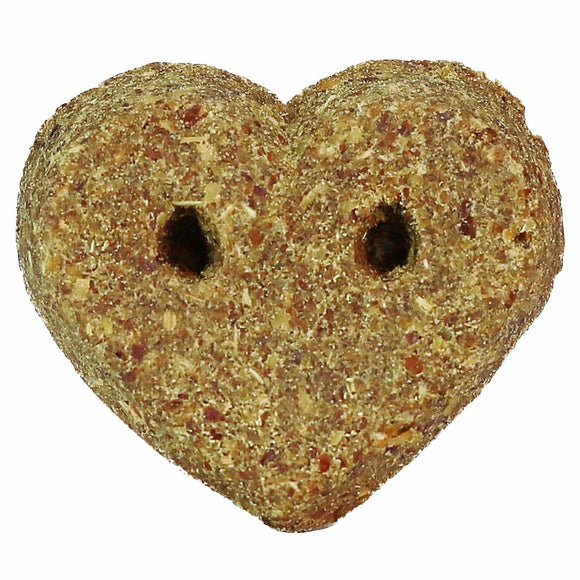 A heart-shaped horse treat from Omega Fields Nibblers with seeds visible