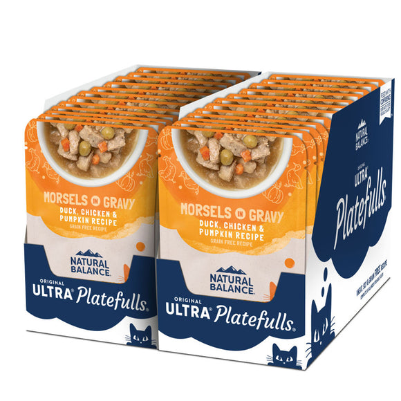 Multiple boxes of Natural Balance Ultra Platefulls cat food on a white background