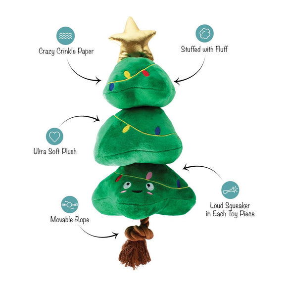 Green plush toy resembling a Christmas tree with features highlighted on a white background