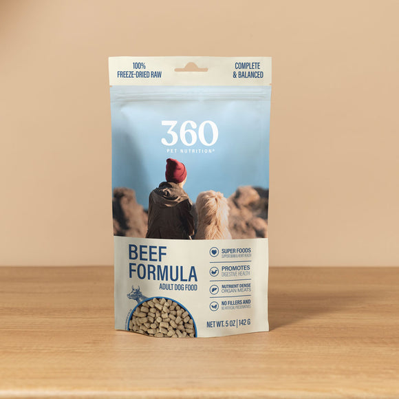 360 Pet Nutrition beef formula dog food package on a wooden surface with a beige background