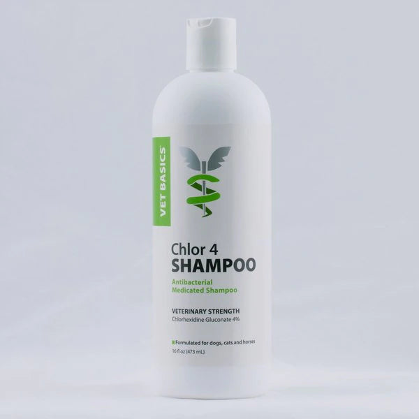 White shampoo bottle with label Vet Basics Chlor 4 Dog & Cat Shampoo, 16 oz