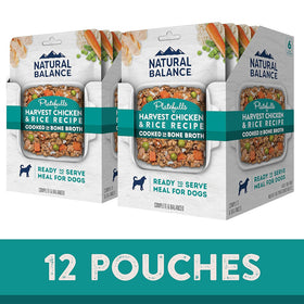 Three packages of Natural Balance dog food with text indicating 12 pouches.