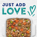 Casserole dish with ground meat, carrots, and peas on a white background with 'Just Add Love' text.