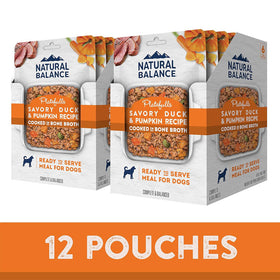 Packaging of Natural Balance Plateduels Savory Duck & Pumpkin Recipe for dogs with an orange banner indicating 12 pouches.