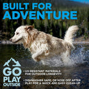 Dog running in water with text 'Built for Adventure' and promotional text about outdoor play.