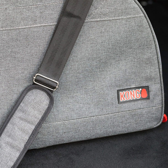 Gray bag with a strap and KONG logo on a black background