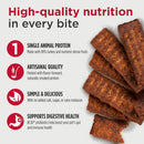 Dog treats with text highlighting high-quality nutrition, single animal protein, artisanal quality, simple & delicious, and digestive health benefits.