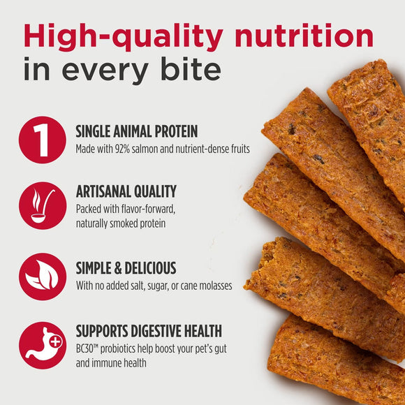 Dog treats with text highlighting high-quality nutrition, single animal protein, artisanal quality, simple & delicious, and digestive health benefits on a white background.