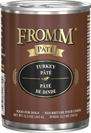 Can of Fromm Turkey Pété dog food on a black background