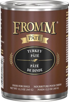 Can of Fromm Turkey Pété dog food on a black background