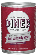 Can of Fromm Diner Favorites Bella's Beef Barkundy Stew dog food on a black background