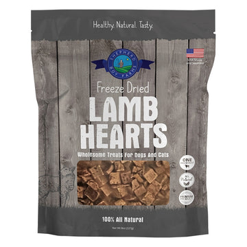 Package of freeze-dried lamb hearts for dogs and cats on a wooden background