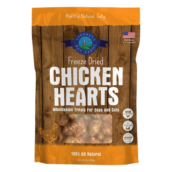 Package of freeze-dried chicken hearts treats for pets on a wooden background