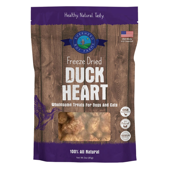 Package of freeze-dried duck heart treats for dogs and cats with a wooden design and purple accents.