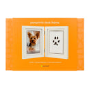 Orange packaging of a pawprints desk frame with a dog photo and paw print on an orange background.