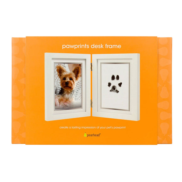 Orange packaging of a pawprints desk frame with a dog photo and paw print on an orange background.