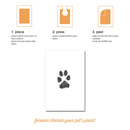 Instructions for using a paw print kit with a sample paw print on a white card.