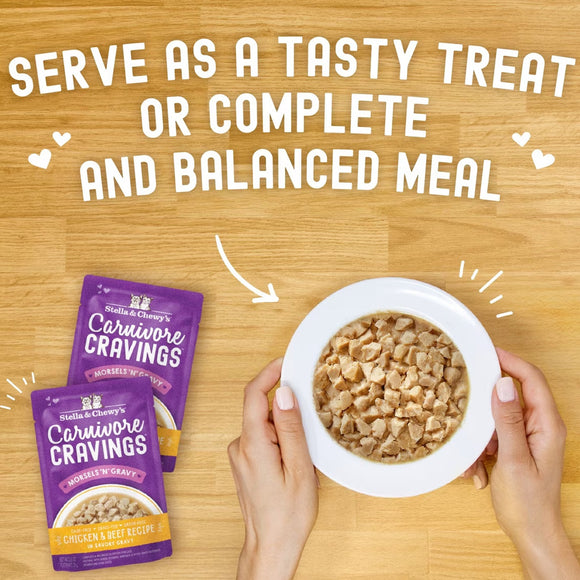 Stella & Chewy's Carnivore Cravings pet food packages with a bowl of pet food on a wooden surface.