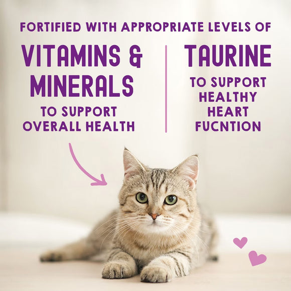 Cat lying on a light surface with text about vitamins, minerals, and taurine for health.
