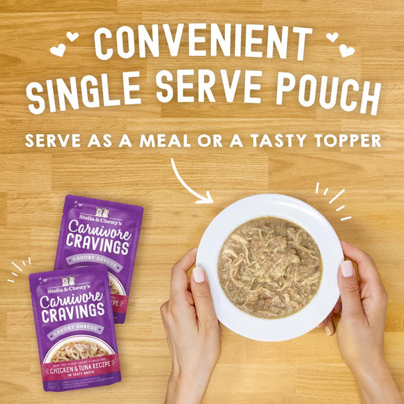 Stella & Chewy's Carnivore Cravings pet food pouches with a bowl of food on a wooden surface.