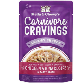 Purple package of Stella & Chewy's Carnivore Cravings Savory Shreds with chicken and tuna recipe on a white background