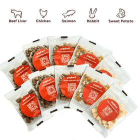 Multiple packages of Pupford dog treats with flavor icons above on a white background