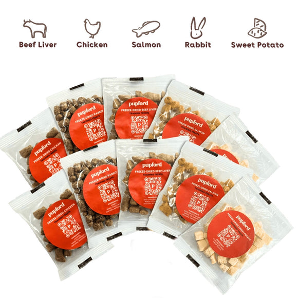 Multiple packages of Pupford dog treats with flavor icons above on a white background