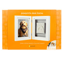 Pawprints desk frame packaging with a dog and pawprint impression on an orange background