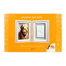 Pawprints desk frame packaging with a dog's pawprint and photo on an orange background