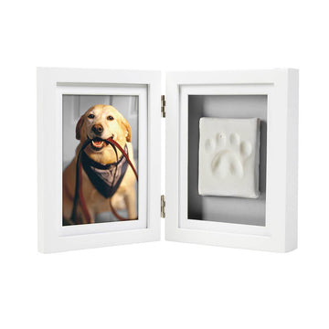 White double-sided frame with a photo of a dog and a paw print on a white background