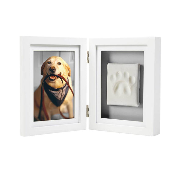 White double-sided frame with a photo of a dog and a paw print on a white background
