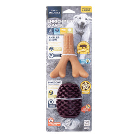 Dog toy packaging with two toys: a brown antler chew and a dark brown pinecone-shaped toy, on a white background.
